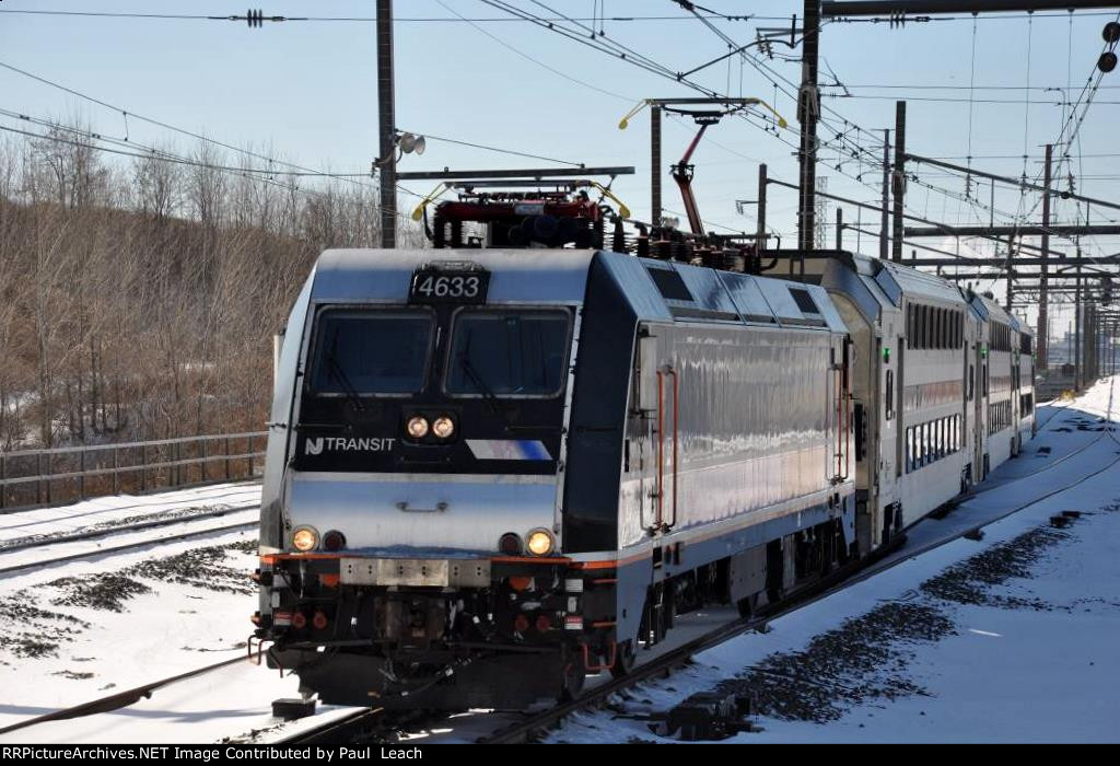 Eastbound commuter approaches its station stop